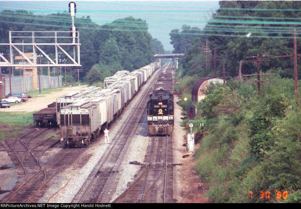 SOU 2694 waits for the yard job to clear up at Boylan